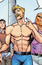 An image of Johnny Storm with no shirt on, proudly pointing out his handle bar moustache.